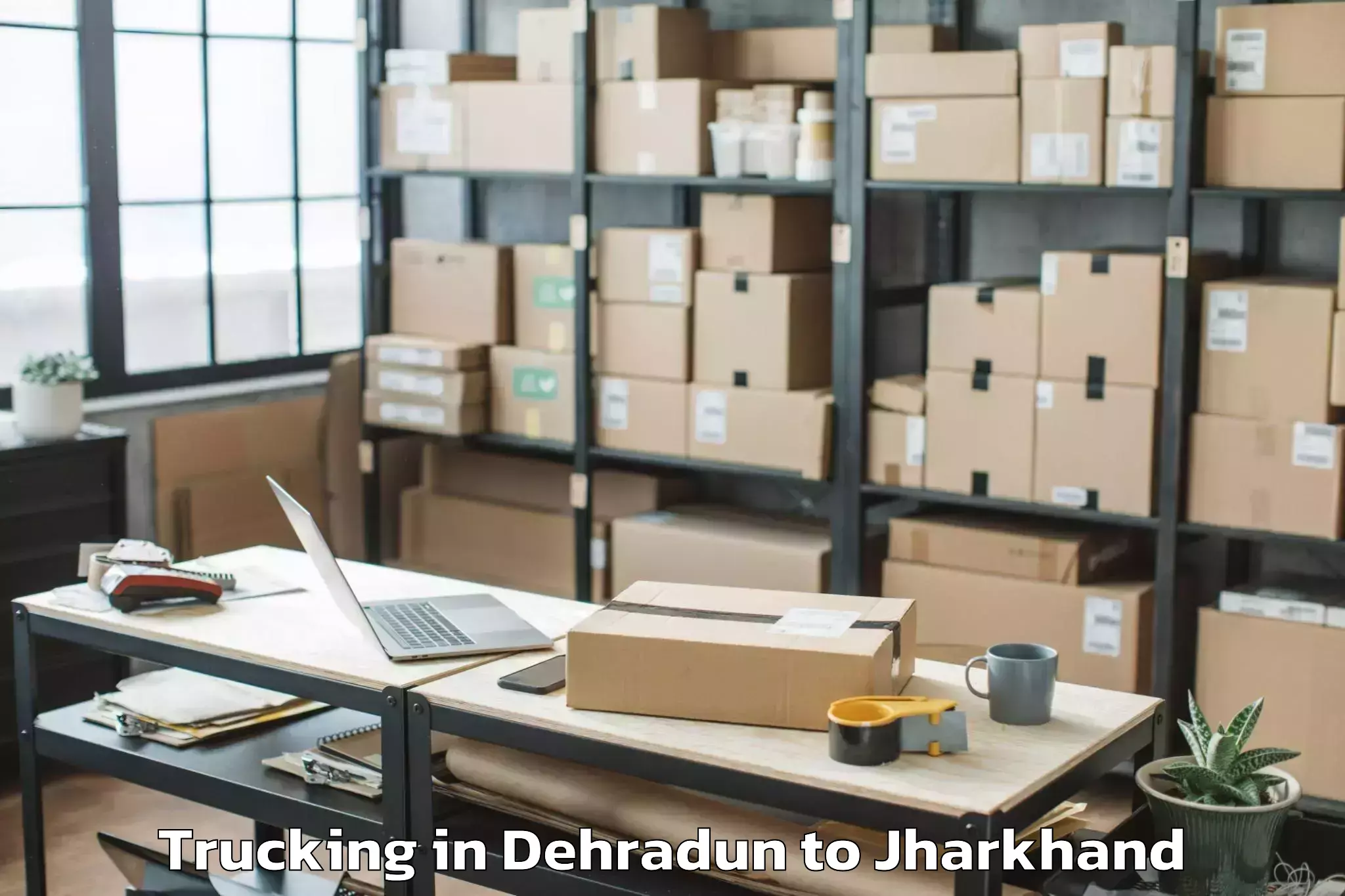 Book Dehradun to Nirsa Trucking Online